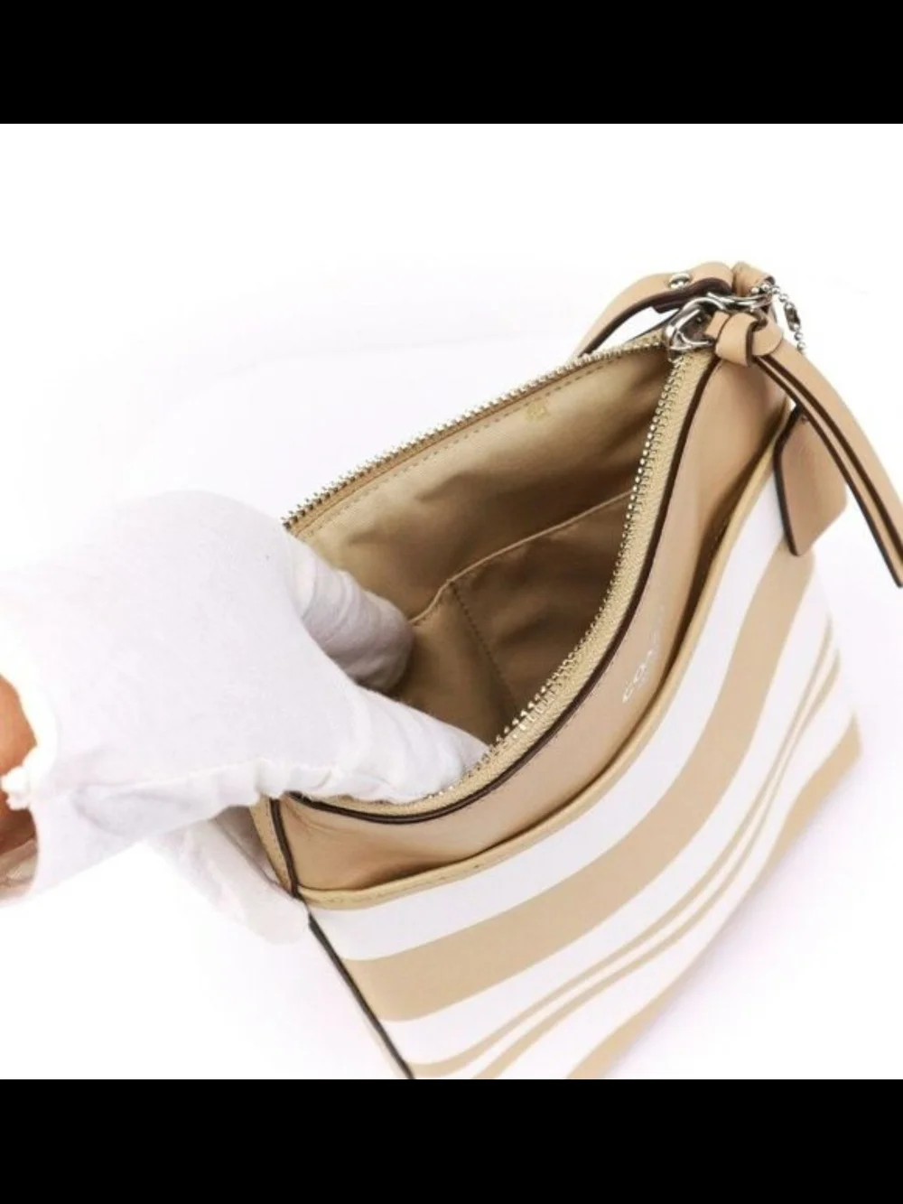 Coach Bleecker North/South Swingpack in Striped Coated Canvas